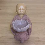 Statuetă Buddha cu suport pentru lumânare în formă de lotus